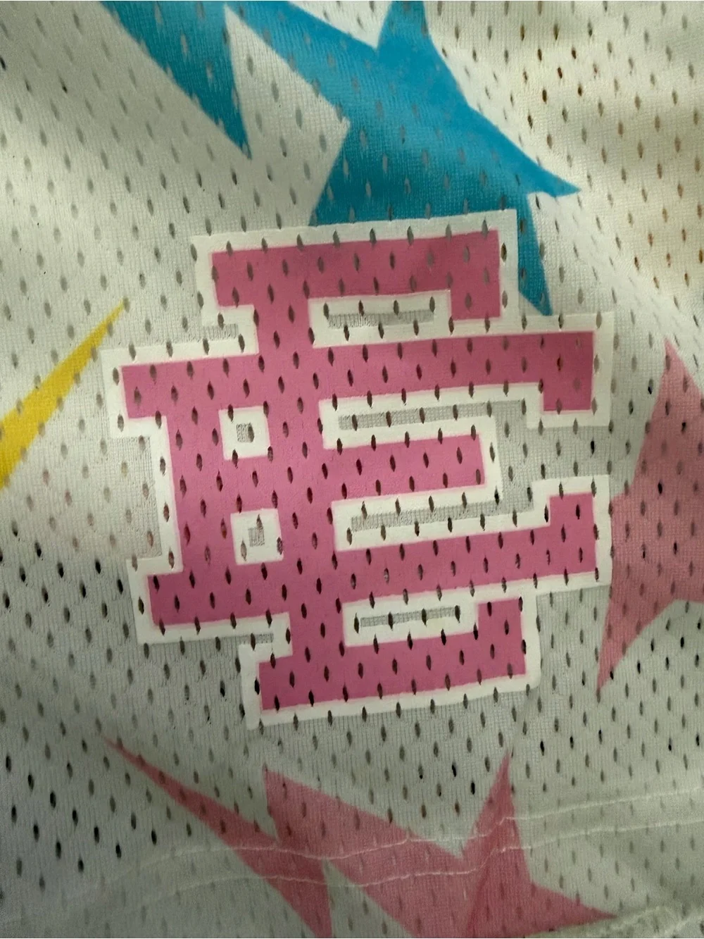 Eric Emanuel White Mesh Shorts with Pink Yellow and Blue Star Pattern